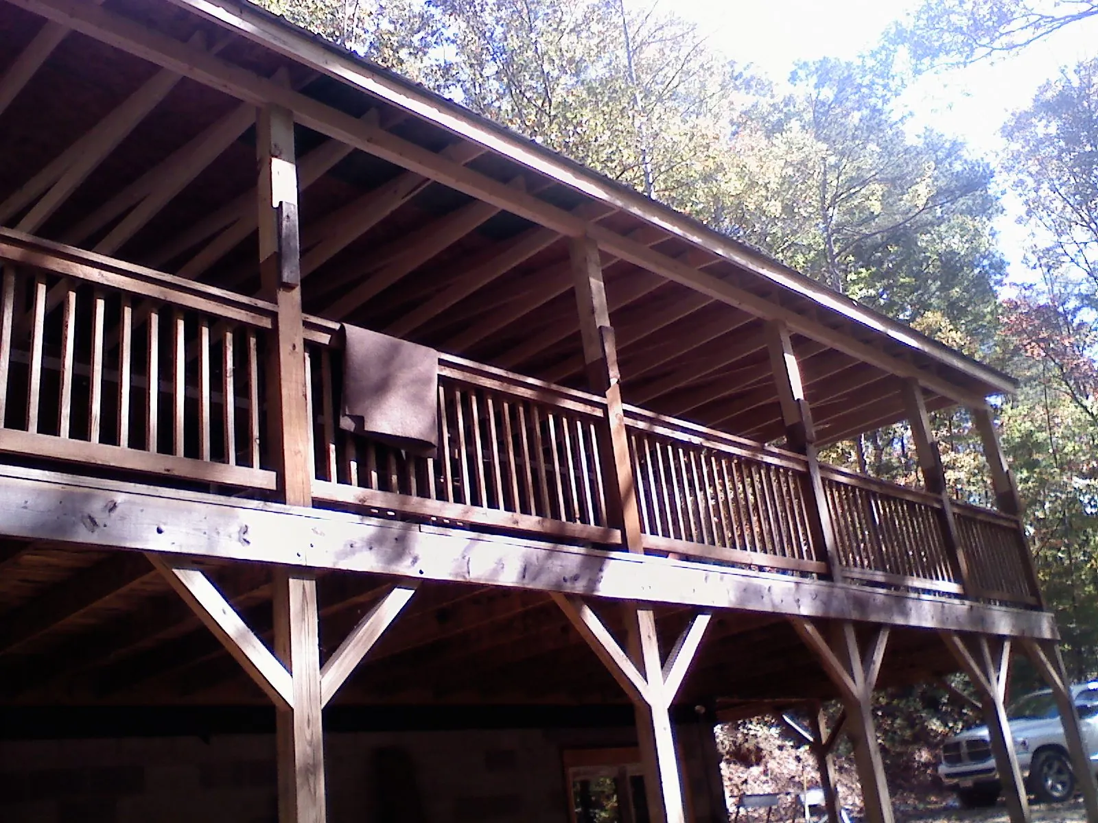 Timber framing under a new elevated porch and deck — Roof Leak Repair in Baxter Springs by Roofing Brothers